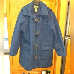 An LL Bean womens large petite wool coat with bone style catches with a hood.